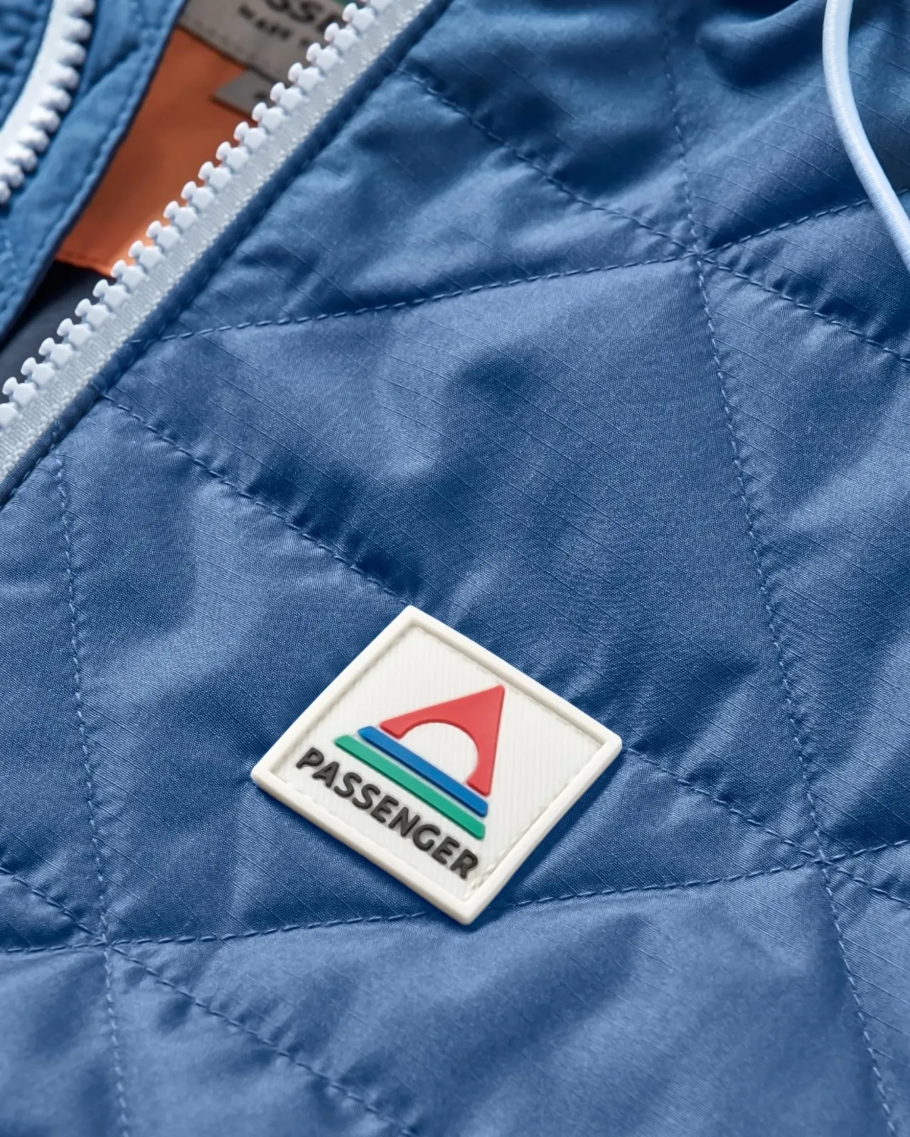 singletrack_recycelte_thermoreisolierjacke__dunkelblauaprikose_6.webp Outlet Singletrack Recycelte Thermore®-Isolierjacke - Dunkelblau/Aprikose Damen Jacken